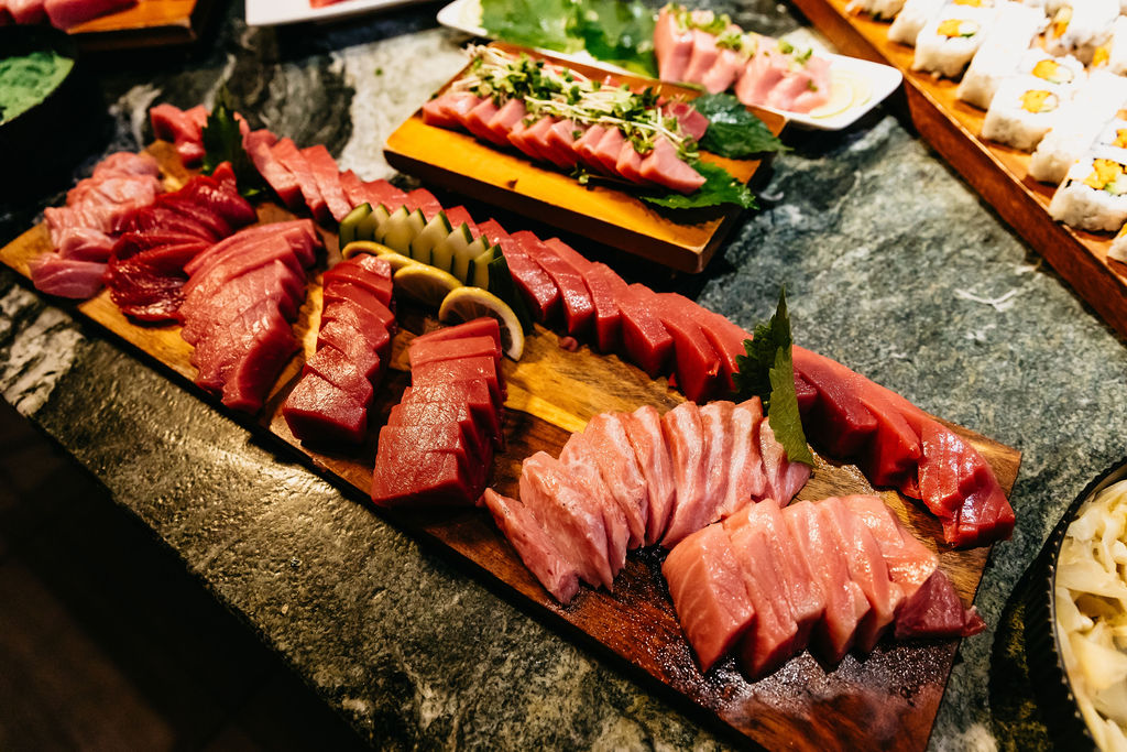 Boards of bluefin sashimi laid out for a full omakase.